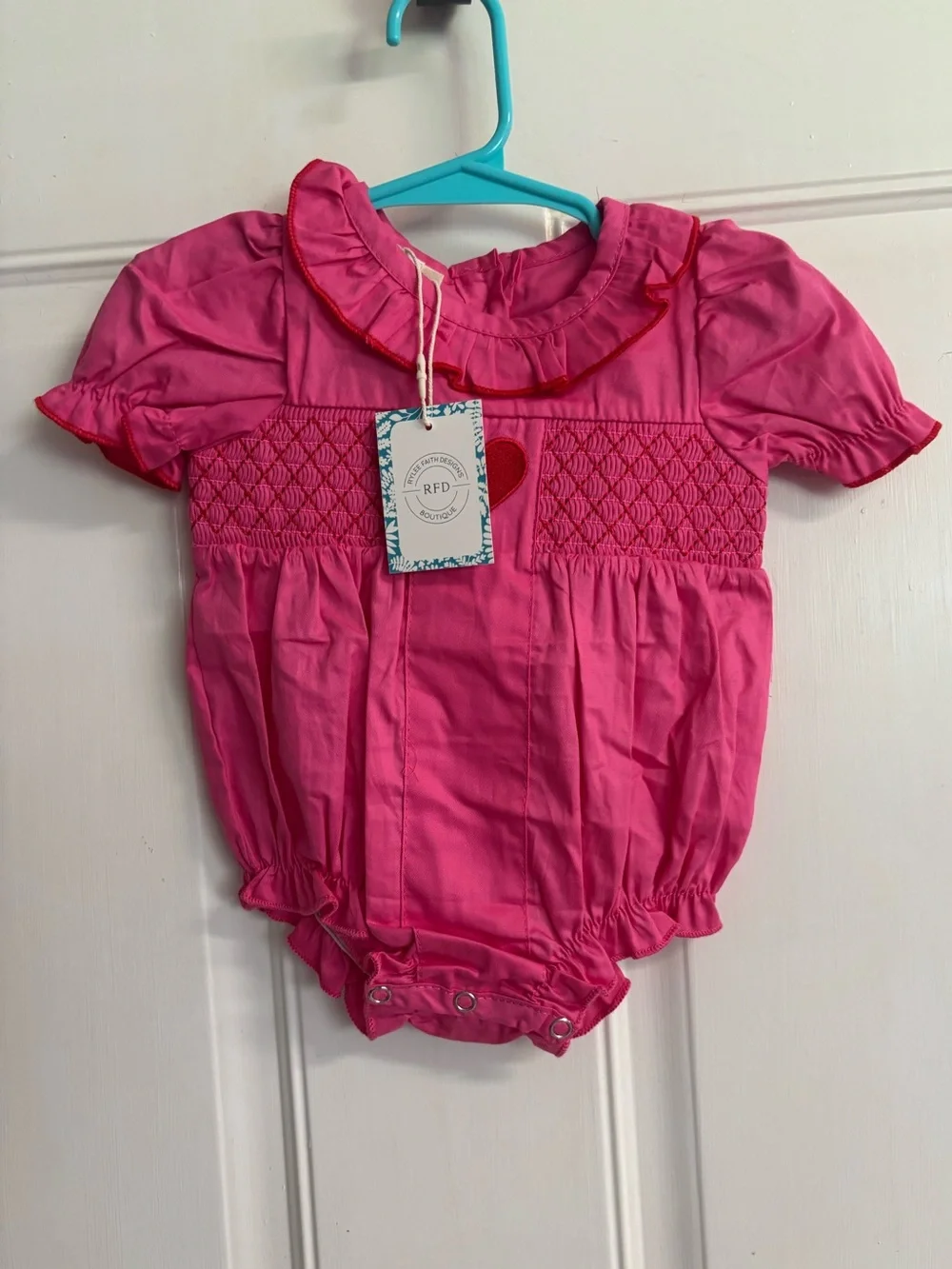 NWT 3M Rylee Faith hot pink, embroidered heart smocked bubble.  Retail 48.99.